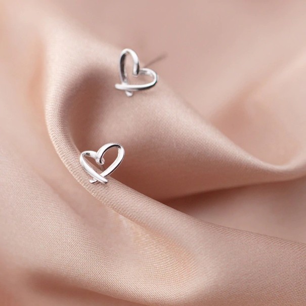 Dames hartvormige oorbellen R52 zilver