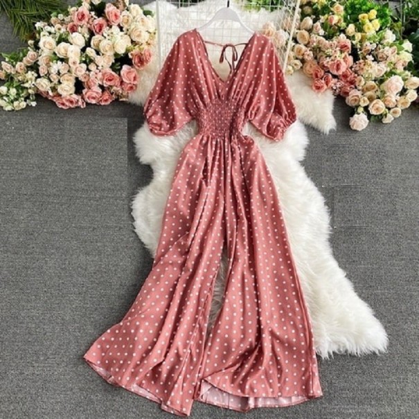 Dames jumpsuit met stippen en korte mouwen roze
