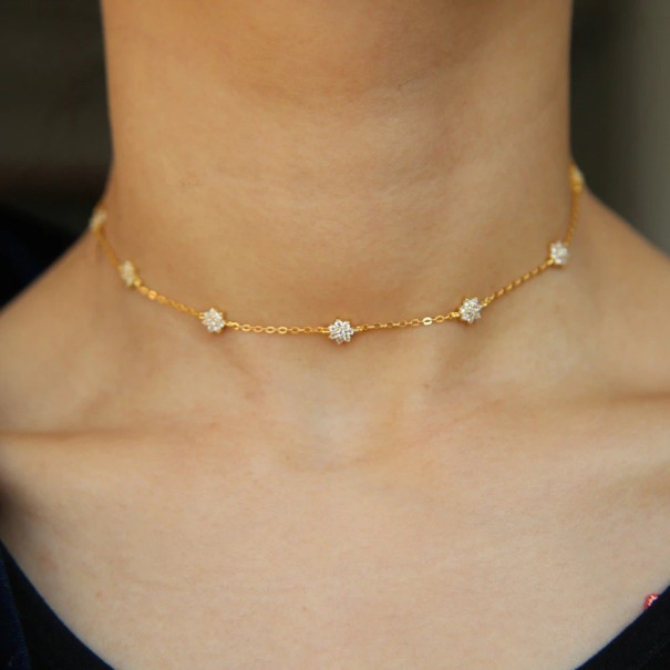 Dames ketting met bloemen J83 goud