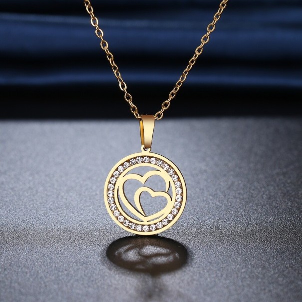 Dames ketting met hartjes D272 goud