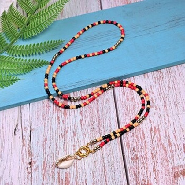 Dames kralenketting met schelp 14