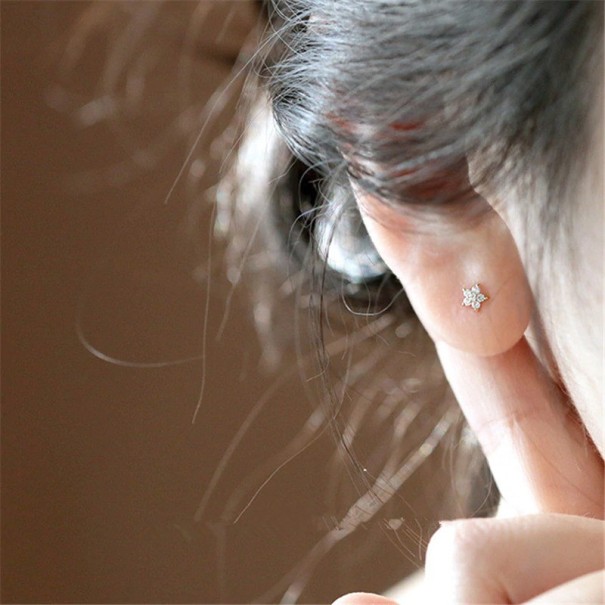 Dames oorbellen bloem H692