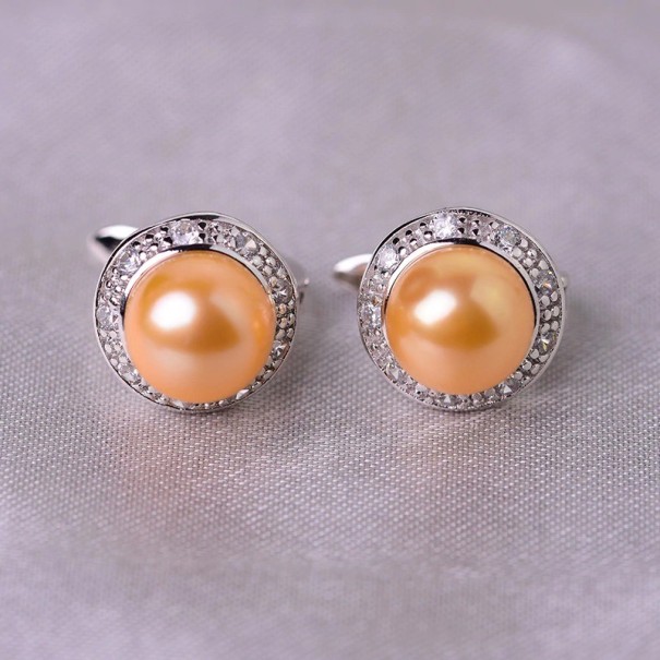 Dames oorbellen met parels en stenen goud