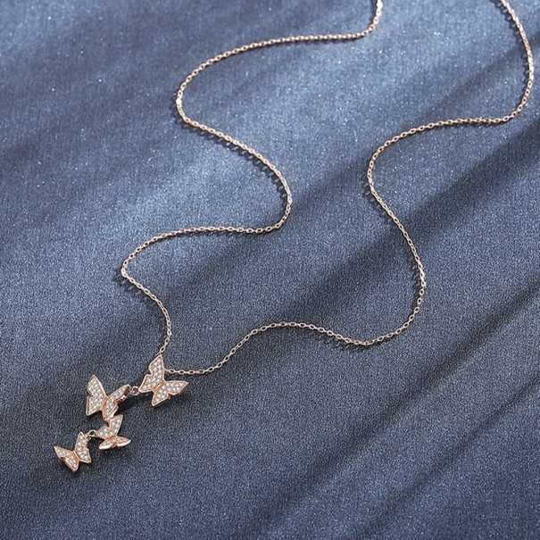 Dames vlinder ketting D670 oudroze
