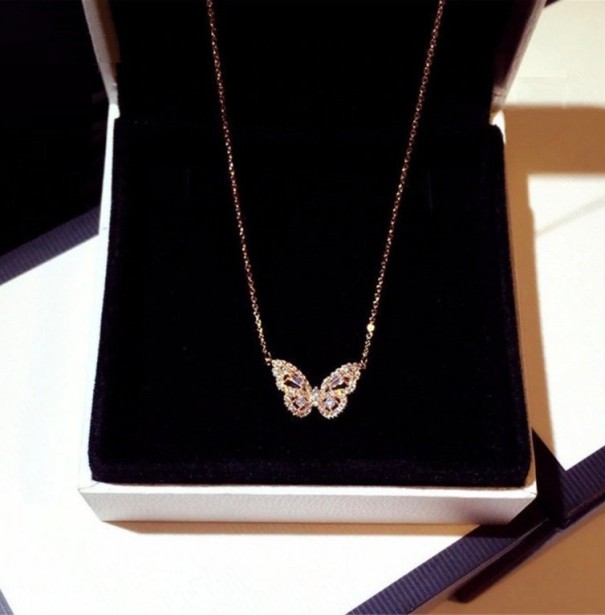 Dames vlinder ketting G471 goud