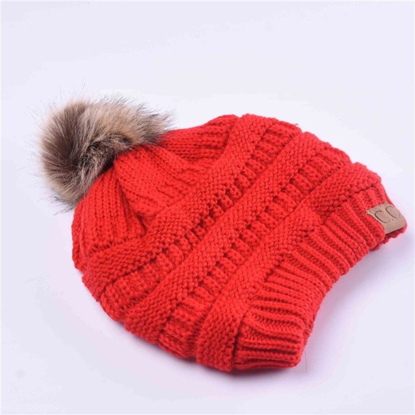 Dames wintermuts met pompon J2863 rood