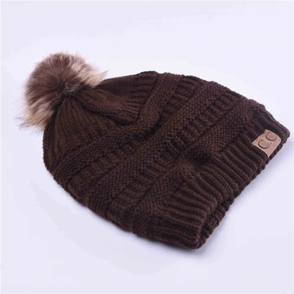 Dames wintermuts met pompon J2863 zwart