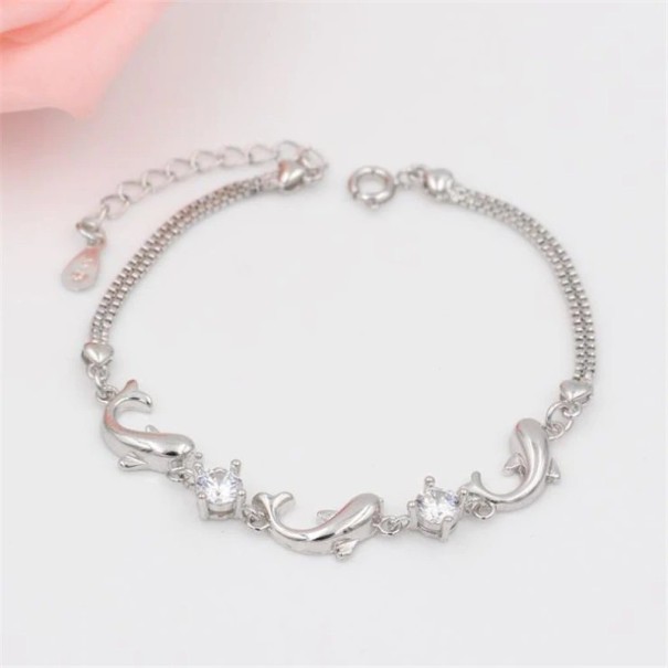 Damesarmband met dolfijnen wit