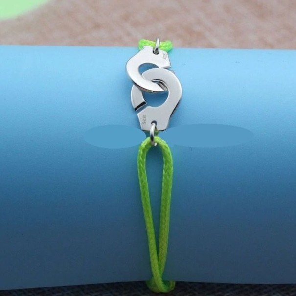 Damesarmband met handboeien groen