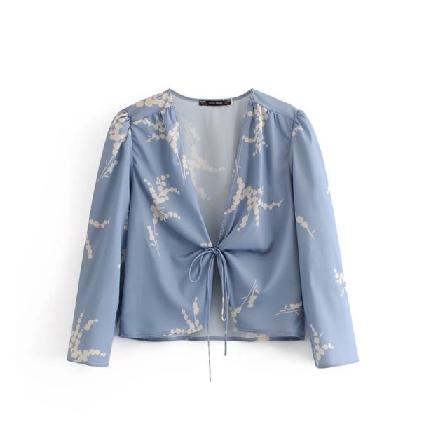 Damesblauwe blouse met strikjes S