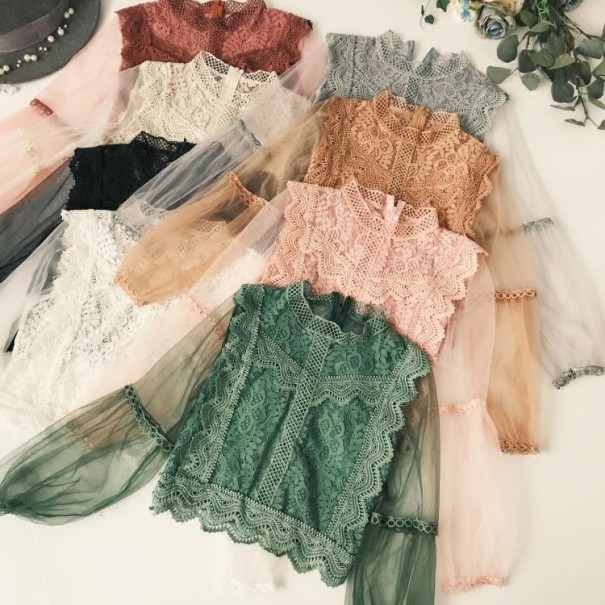 Damesblouse met doorschijnende mouwen