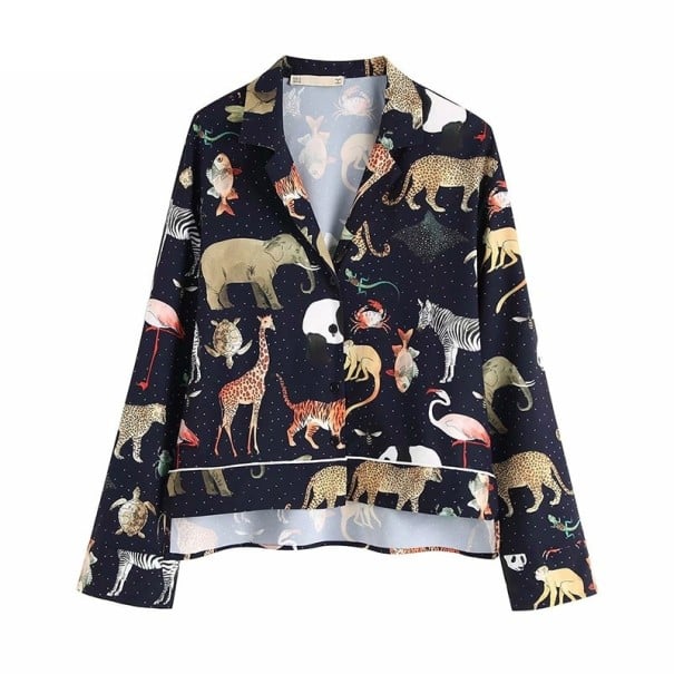 Damesblouse met een dierenprint Losse pasvorm met lange, uitlopende mouwen Reverskraag met diepe halslijn Donkere achtergrond Polyester en katoen S