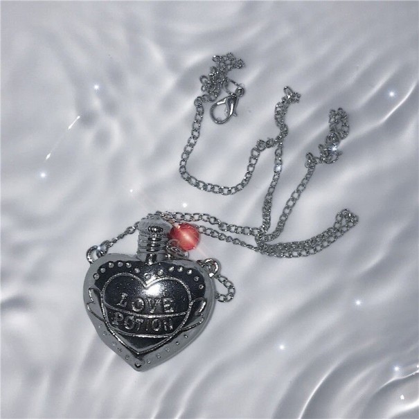 Damesketting met hanger in de vorm van een flesje liefde zilver