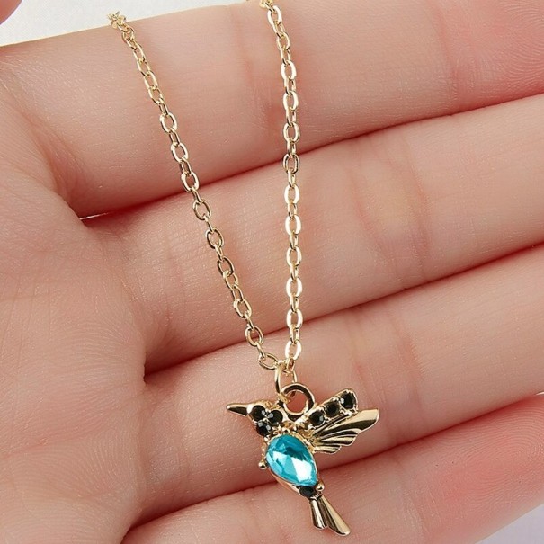 Damesketting met vogel turquoise
