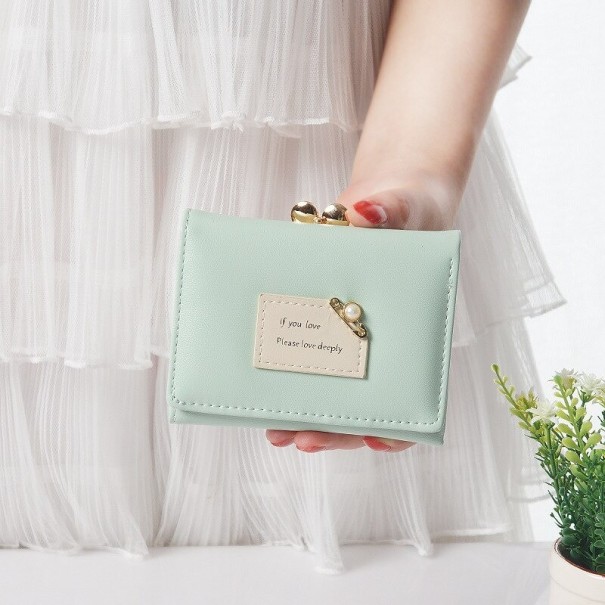 Damesportemonnee met quote turquoise