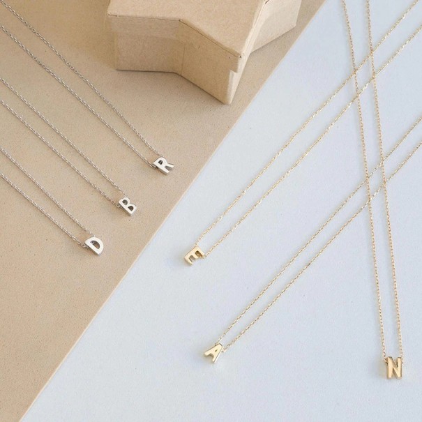 Damhalsband med bokstaven D397