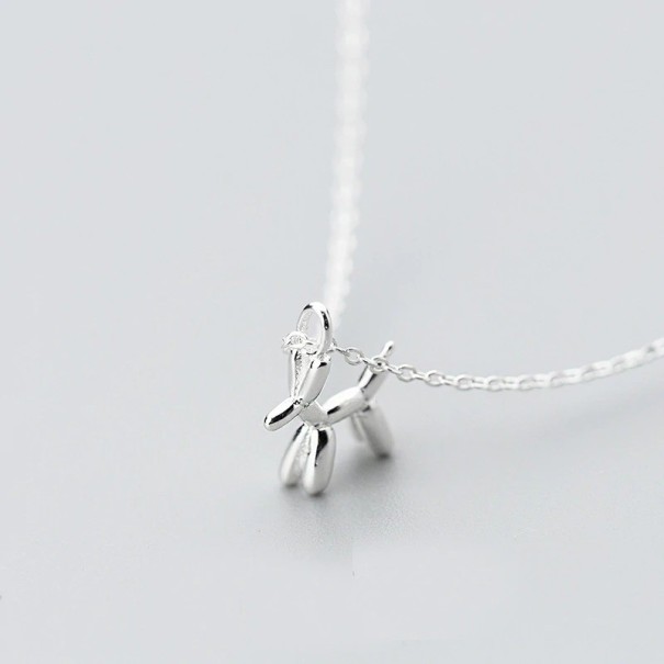 Damhalsband med en hund silver