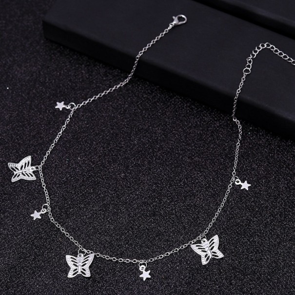 Damhalsband med stjärnor och fjärilar silver