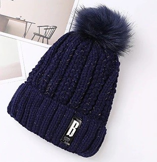Dammössa med pompom J2803 blå
