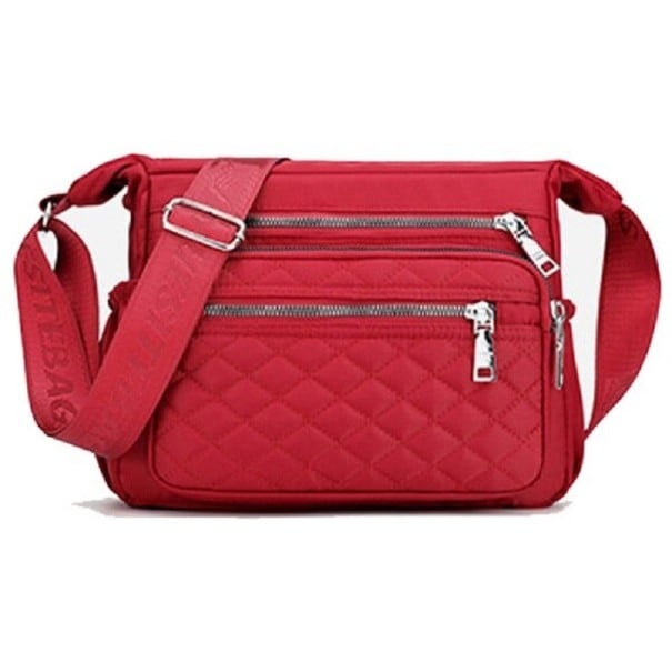 Dámska crossbody kabelka Obdĺžnikový tvar Viac oddielov na zips Prešívaná predná kapsa Široký nastaviteľný popruh Nylon a polyester červená