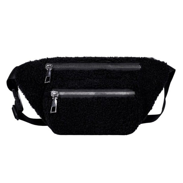 Dámska plyšová ledvinka 28 x 15 x 4 cm Mäkky kudrnatý povrch Dve vrecká na zips Strieborné jazdce Popruh so sponou Nositeľnosť cez telo čierna