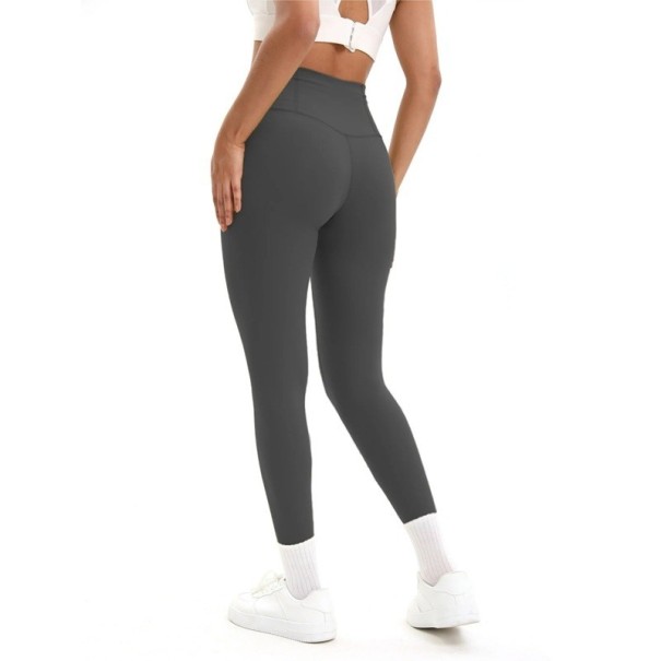 Dámske bezšvové legíny na jogu s vysokým pásom Elastické športové nohavice na cvičenie Fitness legíny pre voľnosť pohybu a komfort sivá L