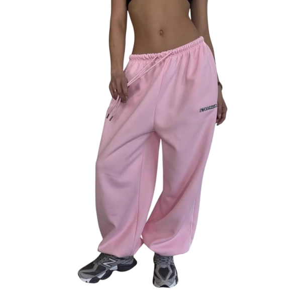 Dámské volné tepláky streetwear s vysokým pasem na gumu se šňůrkou širokými nohavicemi a kontrastním pruhem podél bočního švu růžová L