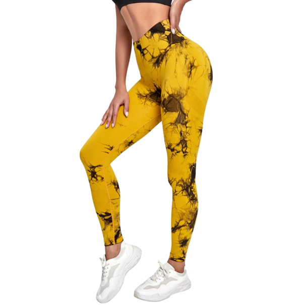 Damskie, barwione metodą tie-dye, bezszwowe legginsy sportowe z wysokim stanem i efektem push-up. Szybkoschnące, elastyczne legginsy. Lekka, oddychająca tkanina. żółty M