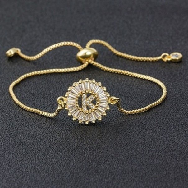 Dámský stahovací náramek s písmenem K