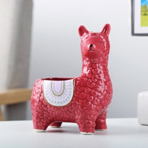 Decoratieve bloempot in de vorm van een lama rood 2