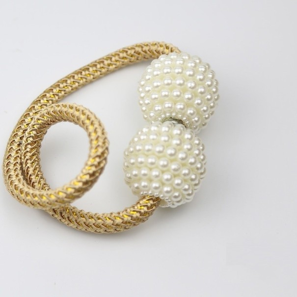 Decoratieve gordijnklem goud