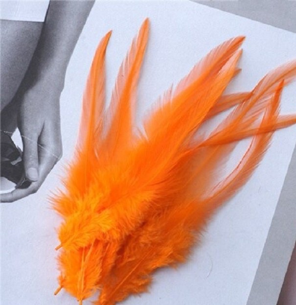 Decoratieve hanenveren 10-15 cm 50 stuks oranje