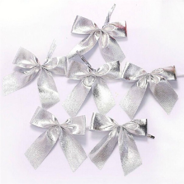 Decoratieve kerststrikken - 12 stuks zilver