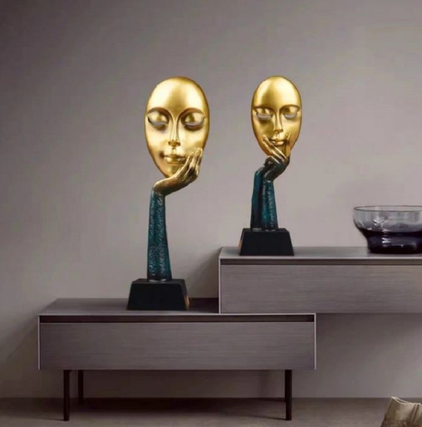 Dekorativ staty ansikte