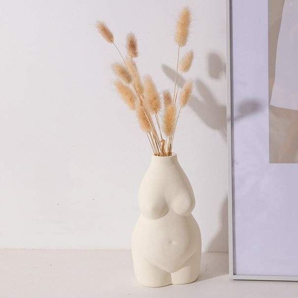 Dekorative Vase in Form eines weiblichen Körpers creme
