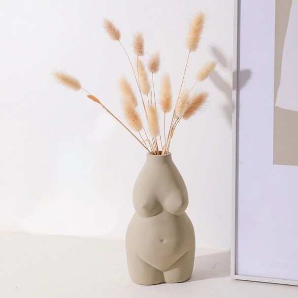 Dekorative Vase in Form eines weiblichen Körpers grau