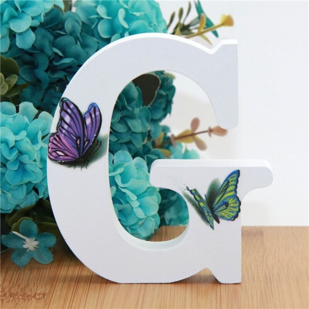 Dekorativní dřevěné písmeno s motýly G