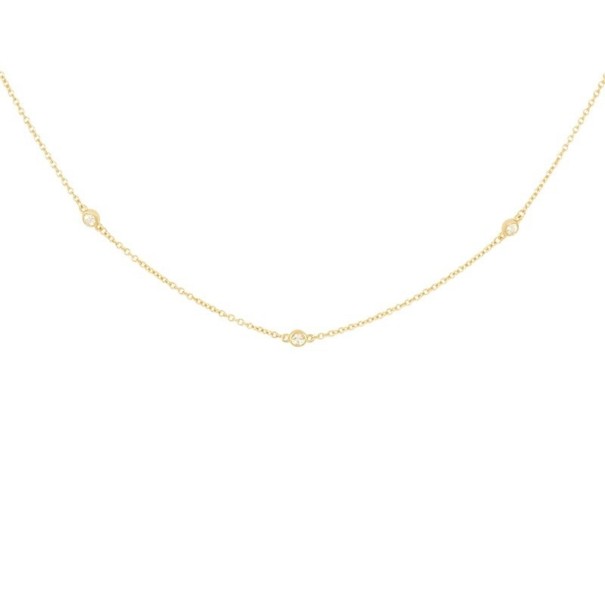 Delicado collar de mujer con piedras. dorado