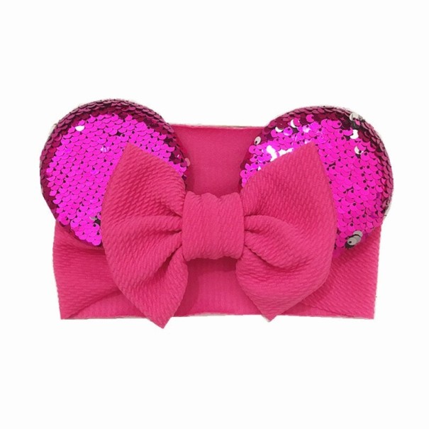 Diadema de niña con lazo rosa oscuro
