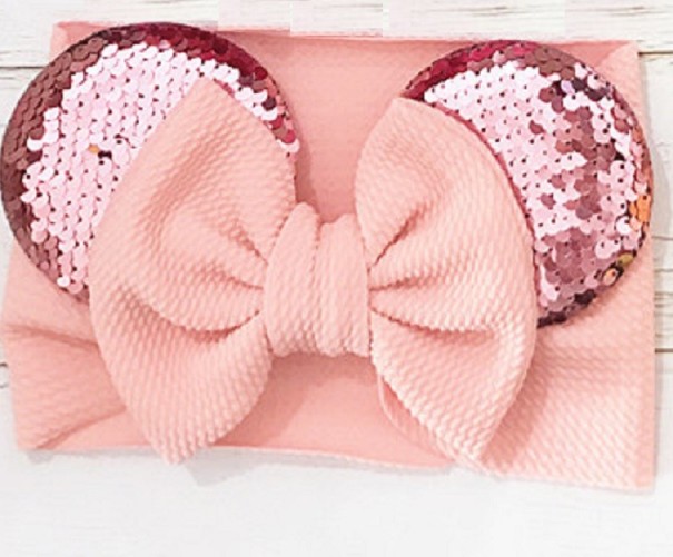 Diadema de niña con lazo rosa