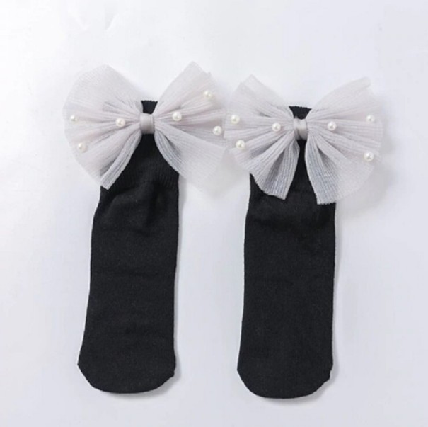 Dievčenské ponožky s veľkou mašľou a perlami čierna 5-7 rokov