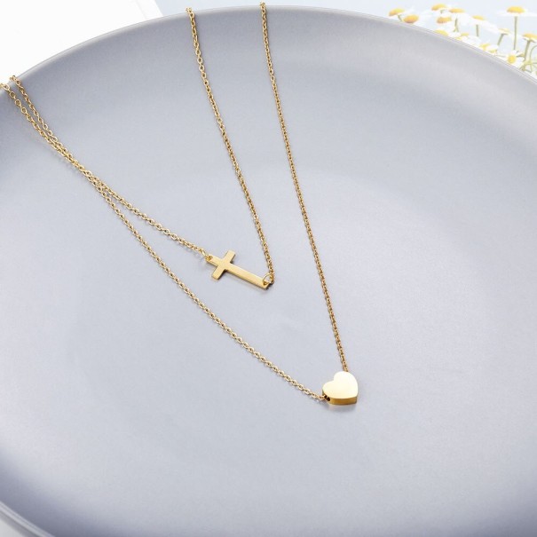 Dubbele damesketting met kruis goud