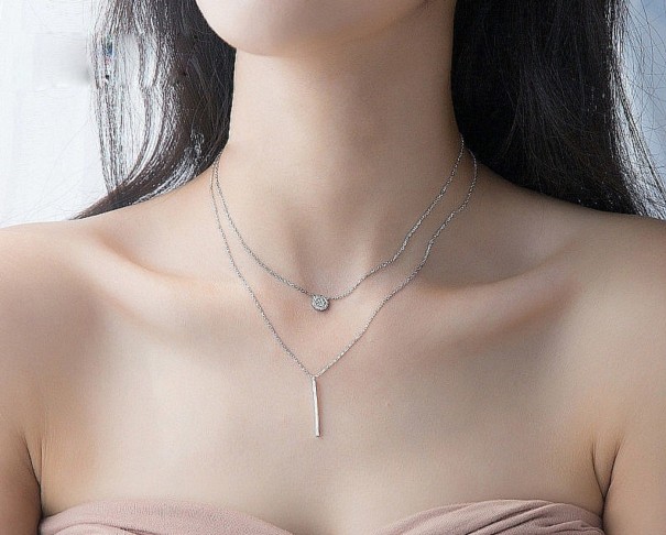 Dubbelhalsband för kvinnor med stång 1
