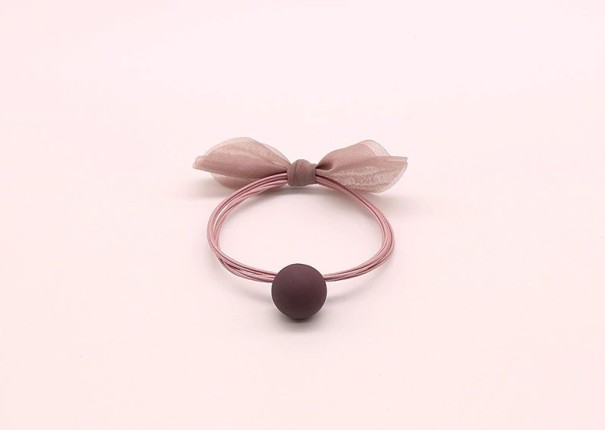 Élastique à cheveux tendance avec nœud rose