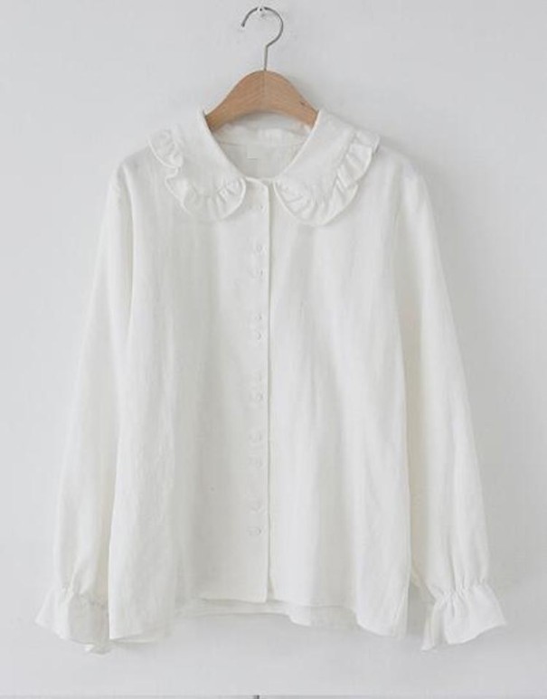 Elegant bluse med knapper hvid L
