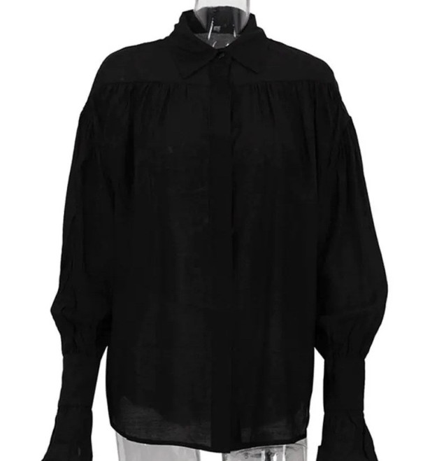 Elegant damblus med lång ärm Enfärgad blus i polyester med utsvängda ärmar och krage Stilig topp med knappar svart S