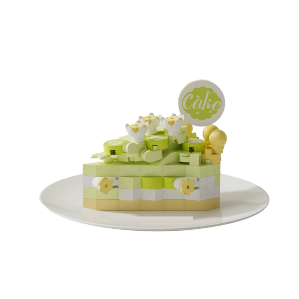 Ensemble de construction de morceau de gâteau en teintes vertes et crème avec des fleurs et des décorations 5,5 x 3,5 x 4,5 cm Modèle décoratif 1