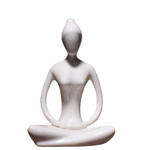 Estatuilla de cerámica de un yogui 1
