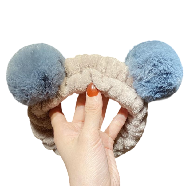 Faixa de cabelo cosmética com pompons azul