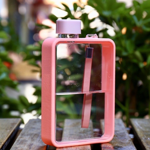 Flacon de călătorie plat C198 roz